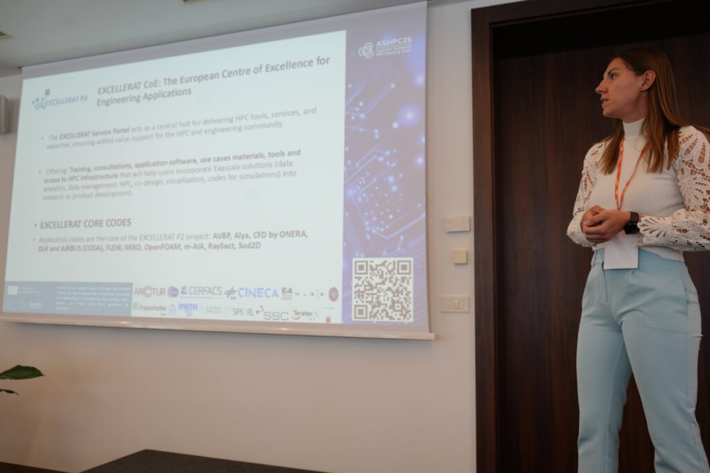Tina C. Marc representing EXCELLERAT P2 on stage at the ASHPC Meeting 2025