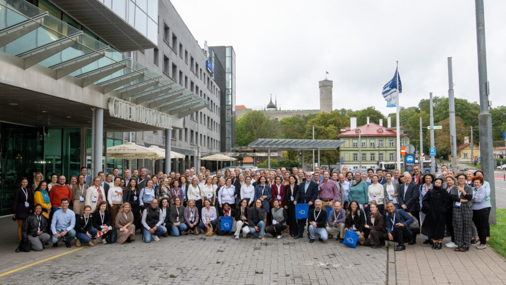 Group photo from the event in front of the venue