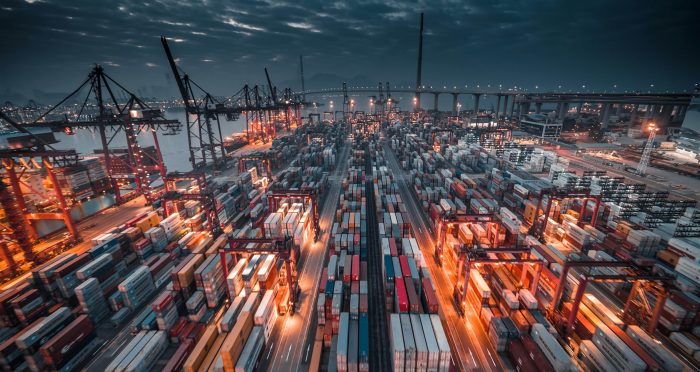 In this section, we look at simulations like large workload of containers waiting to be shipped through many vessels trips. (Photo: Timelab on unsplash).